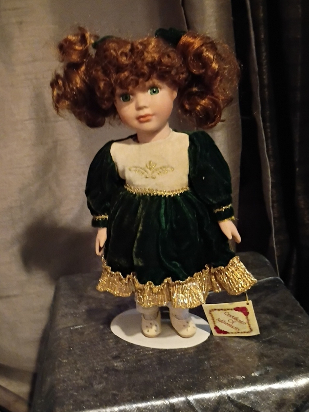 Green Velvet Porcelain-Style Doll with Cream Bodice and Gold Trim